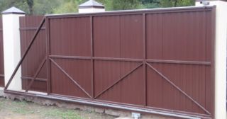 Купить откатные ворота из профнастила Дагестанские Огни, цена от 1738 руб.